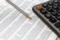 Pencil and calculator on desk table with financial documents Royalty Free Stock Photo