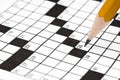 Pencil on a crossword puzzle Royalty Free Stock Photo