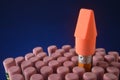 Pencil with eraser topper within a cluster of pencils with erasers Royalty Free Stock Photo