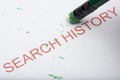 Pencil Erasing the Word `Search History` on Paper