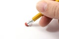 Pencil erasing on paper. Royalty Free Stock Photo