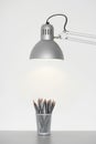 Pencil Holder Under Adjustable Lamp Royalty Free Stock Photo