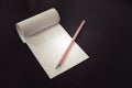 Pencil laying on blank note paper, Creative work, writing, drawing concept Royalty Free Stock Photo