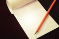 Pencil laying on blank note paper, Creative work, writing, drawing concept Royalty Free Stock Photo