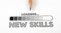 Pencil and loading bar graphic symbolizing the process of learning new skills and personal development Royalty Free Stock Photo