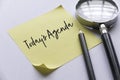 Pencil, magnifying glass and yellow memo note written with Today's Agenda on white background Royalty Free Stock Photo