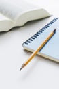 Pencil and notebook and dictionary on the desk Royalty Free Stock Photo