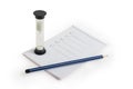 Pencil, notebook and hourglass Royalty Free Stock Photo