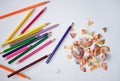 Pencil peels from sharpening and a colored pencils Royalty Free Stock Photo