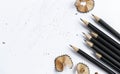 A pencil and a piece of a pencil on white paper background. Copy space for your text or image Royalty Free Stock Photo