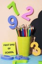 Stationery and text first day of school Royalty Free Stock Photo