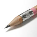 A pencil with a sharpened wood tip and dark graphite core is shown. The metallic Royalty Free Stock Photo