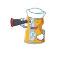 Pencil sharpener cartoon happy Sailor style with binocular Royalty Free Stock Photo