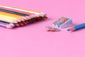 Pencil sharpener with color pencils Royalty Free Stock Photo