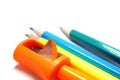 Pencil sharpeners and colored pencils in a pile, Conceptual art Royalty Free Stock Photo