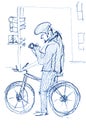 Pencil sketch. A male cyclist has stopped at a traffic light. He is looking at his mobile phone. Royalty Free Stock Photo