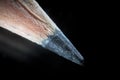 Pencil tip macro. Graphite lead by microscope. Stationery writing accessories