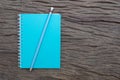 Pencil on top of book mockup on the old wood Royalty Free Stock Photo