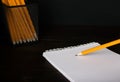 Pencil writing on white paper closeup Royalty Free Stock Photo