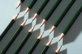 Pencils arrranged to cause a zigzag pattern