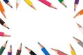 Pencils background. Scattered colored pencils. Mock up pencil or crayons. Colorful pencils frame border on White Background,