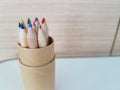 Pencils in a box with one broken pencil Royalty Free Stock Photo