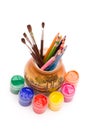 Pencils and brushes in vase Royalty Free Stock Photo