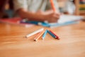 Pencils, crayons and pens on a table for creative drawing, artwork and art education in a classroom at school. Coloring Royalty Free Stock Photo