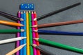 Pencils with dice and domino on a grey background.Flag of the Italian peace organization PACE