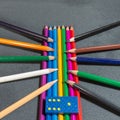 Pencils with dice and domino on a grey background.Flag of the Italian peace organization PACE