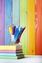 Pencils and felt-tip pens with books Royalty Free Stock Photo