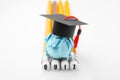 Pencils with QUIZ inscription. Paper education figure with graduation cap