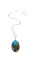 Pendant with a blue gemstone Royalty Free Stock Photo