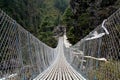 Pendant bridge with buddhist prayer flags Royalty Free Stock Photo