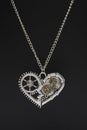 Pendant heart in steampunk style on black