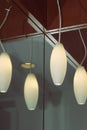 Pendant lamps of frosted glass bounce shadowy light