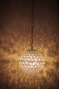 Pendant light lamp illuminated, Elegant Chandelier illuminated. round lamp in the interior Royalty Free Stock Photo