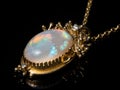 Pendant of a necklace made of gold, opal gemstone Royalty Free Stock Photo