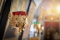 Pendant oil lamp in the orthodox church. Religious paraphernalia. Orthodox Church. Oil lamp close up.