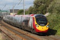 Pendolino electric train in special X-men livery. Royalty Free Stock Photo