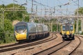 Pendolino Train overtakes a Class 350 Communiter Train