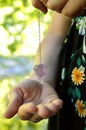 Pendulum dowser with amethyst Royalty Free Stock Photo