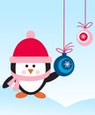 Penguin with hat and scarf with decaration balls Royalty Free Stock Photo