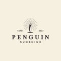 Penguin hipster sunburst logo design