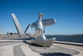 Penguin Sculpture and Suspension Bridge Royalty Free Stock Photo
