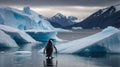 A penguin stands on icy waters with glaciers and mountains in the background Royalty Free Stock Photo