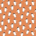 Penguins walking, hand drawn doodle, sketch, seamless pattern design on soft orange