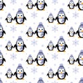 Penguins in a knitted hat. Snowfall. Seamless pattern. Vector. Flat.