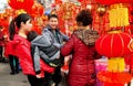 Pengzhou, CH: Famil Buying New Year Decorations