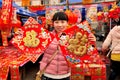 Pengzhou, CH: Woman Selling New Year Decorations